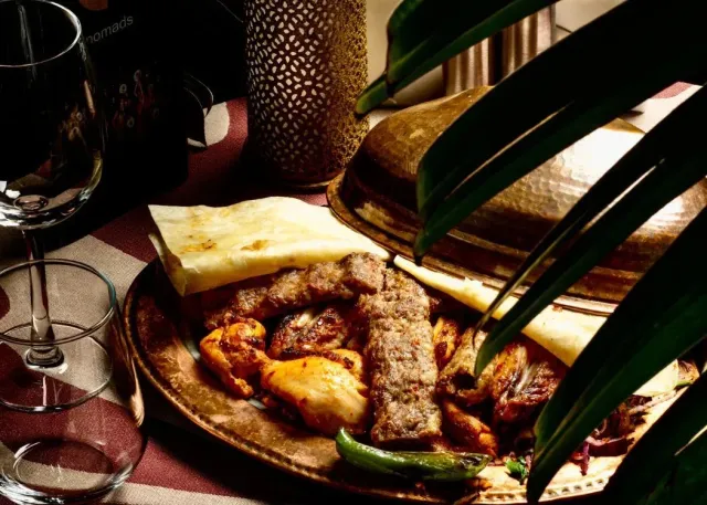 Premium Dining Experience with Exclusive Shows at Nomads Restaurant