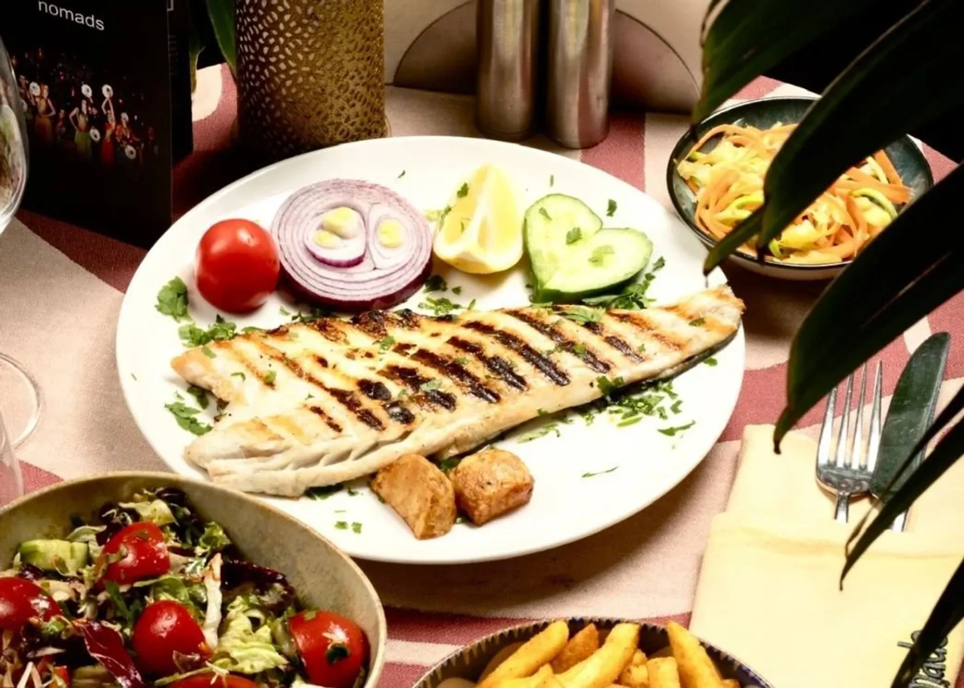 Premium Dining Experience with Exclusive Shows at Nomads Restaurant
