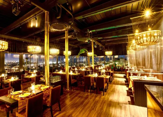 Premium Dining Experience with Exclusive Shows at Nomads Restaurant