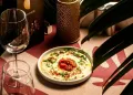 Premium Dining Experience with Exclusive Shows at Nomads Restaurant
