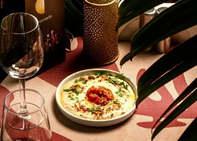 Premium Dining Experience with Exclusive Shows at Nomads Restaurant